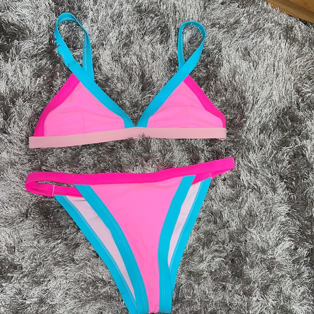 Pink and blue bikini shein size large that’s more like a m/s